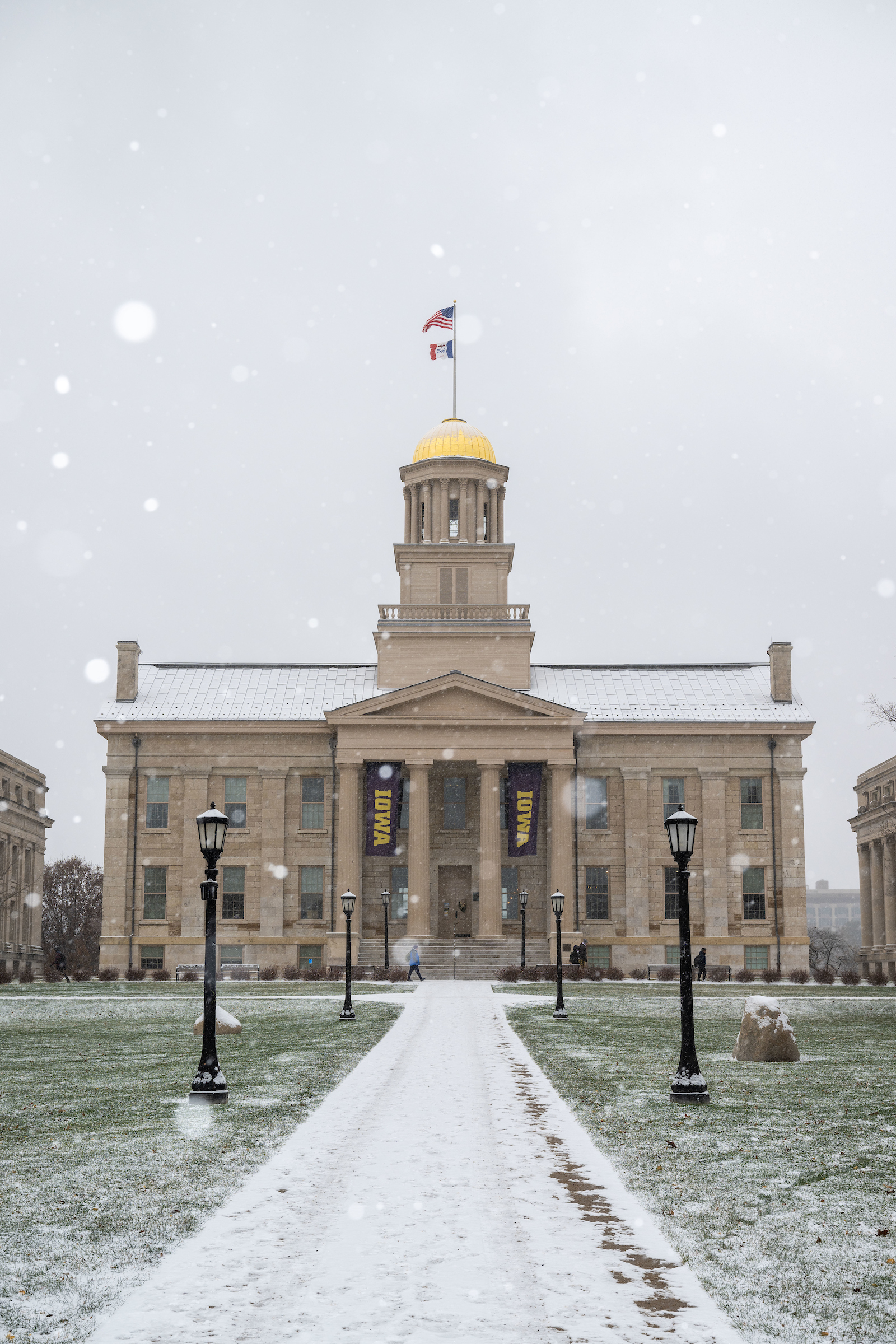 Old Capitol with snow falling